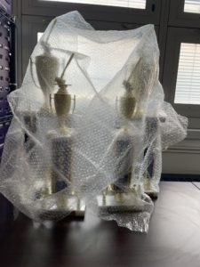 2022 trophies wrapped in plastic